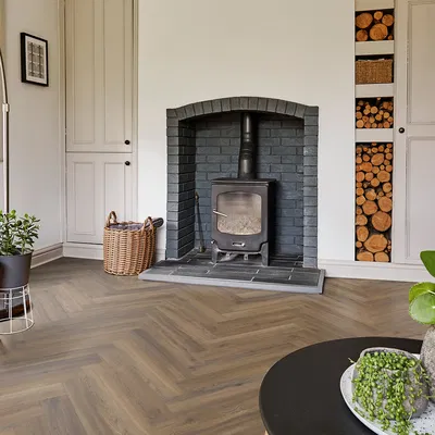 Polyflor vs Karndean LVT: Which Brand Is Better in 2025? 24 Polyflor Camaro Rigid Core - Astoria Oak Herringbone RPQ4147
