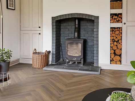 Polyflor vs Karndean LVT: Which Brand Is Better in 2025? 24 Polyflor Camaro Rigid Core - Astoria Oak Herringbone RPQ4147